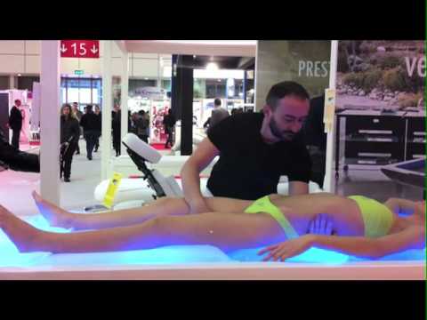Lomi Lomi demonstration on a water massage table